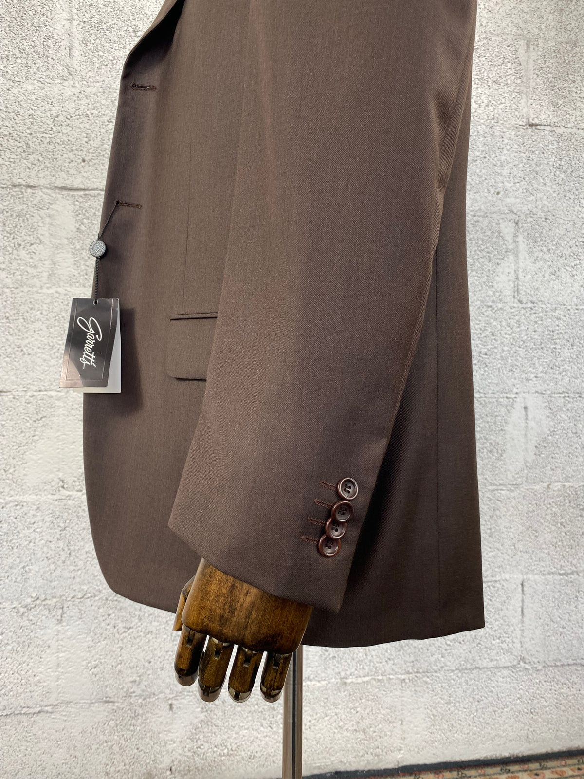 Manica e polsino della giacca Garrett's marrone con cartellino