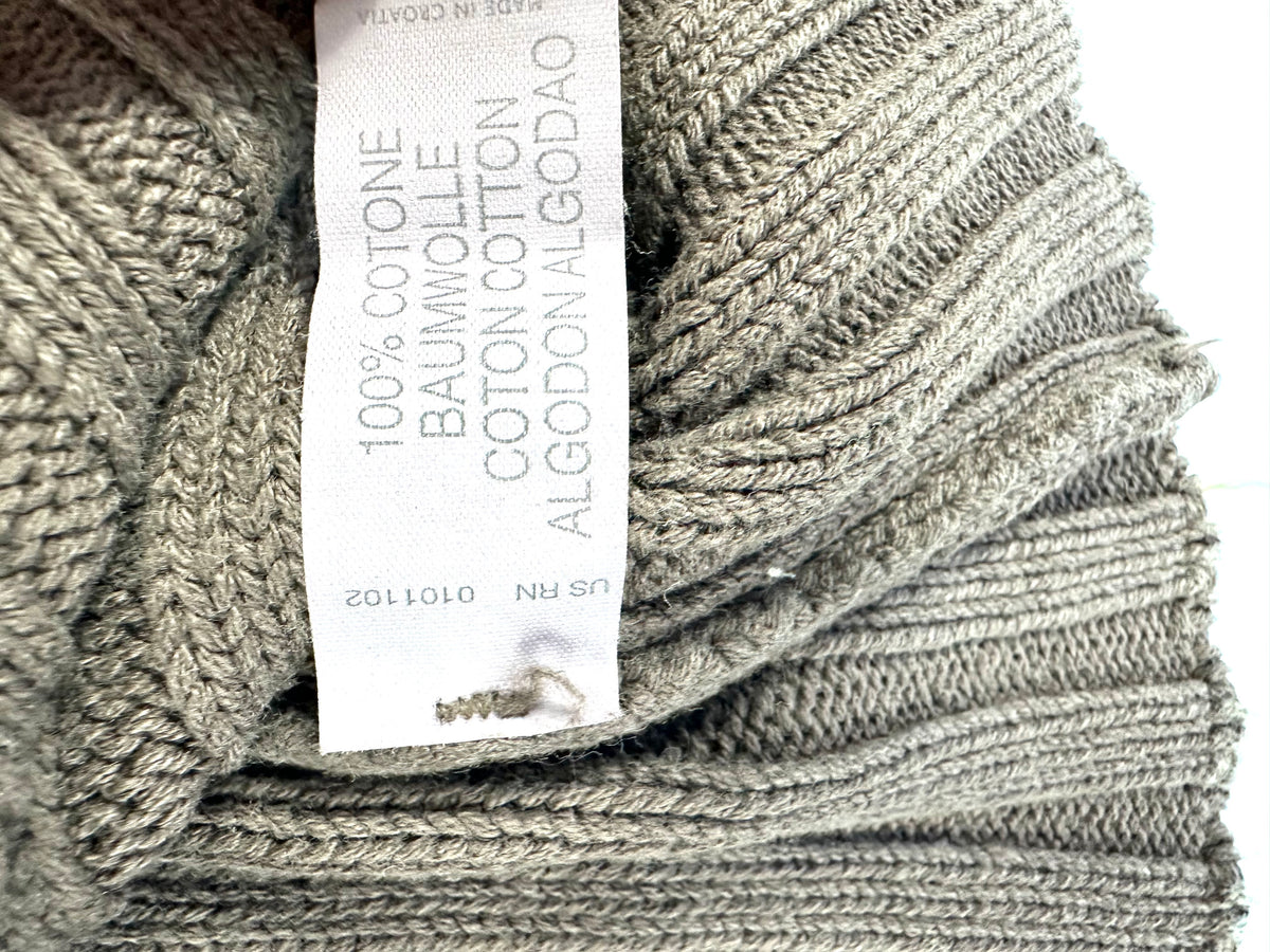 Etichetta interna del maglione con la composizione 100% cotone