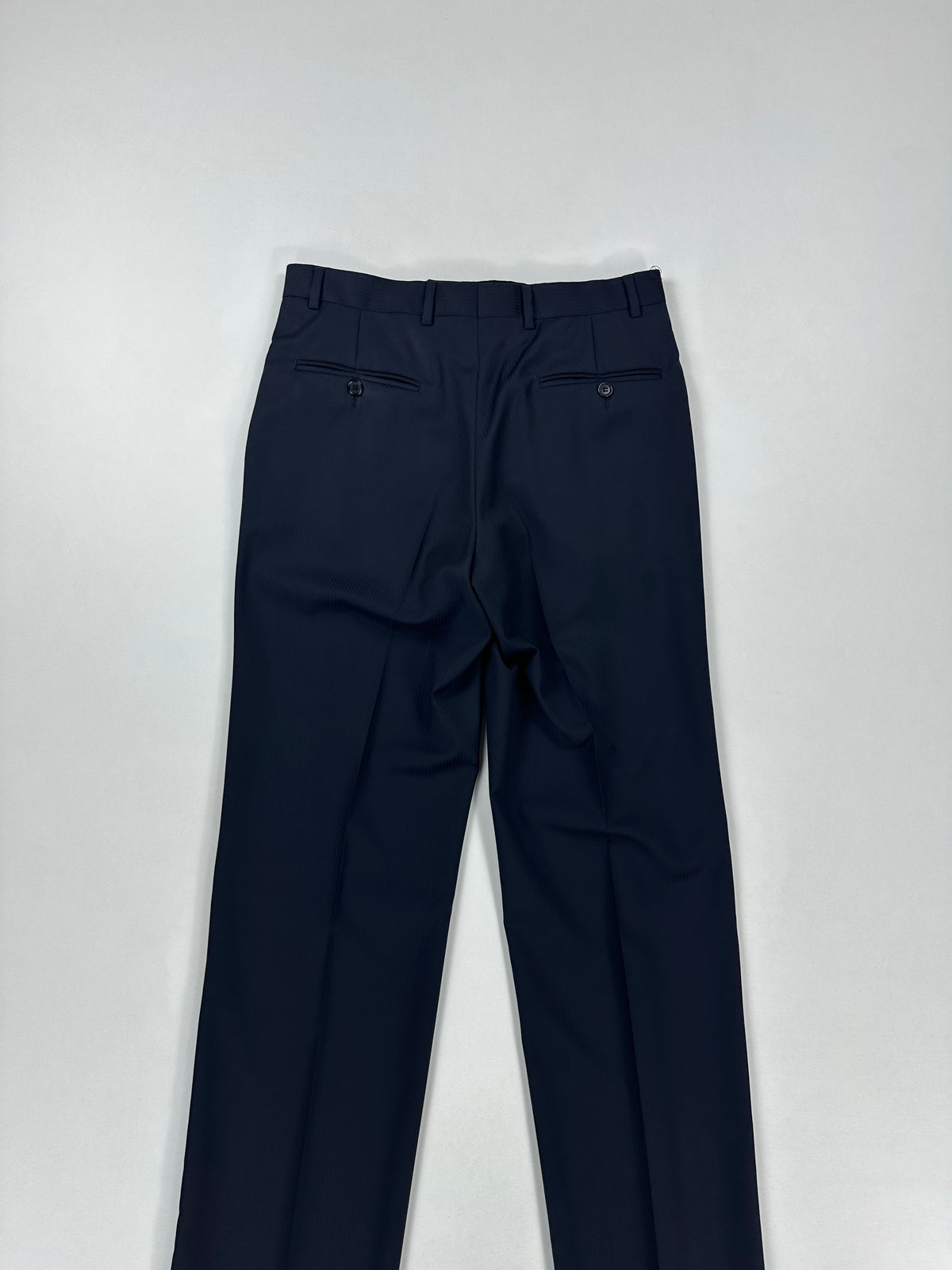 Retro del pantalone Aquascutum con tasche posteriori a filetto