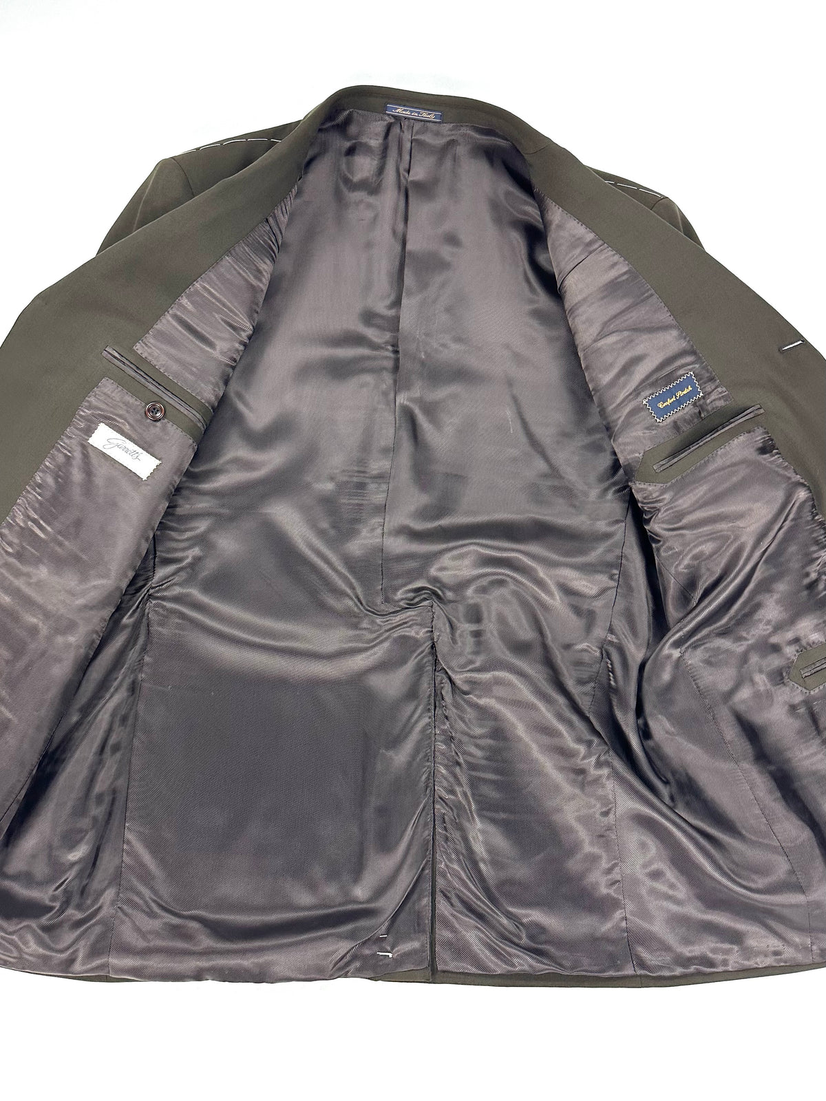 Giacca Garrett's aperta: fodera 100% Bemberg con le etichette Garrett's e Confort Stretch sulle tasche interne