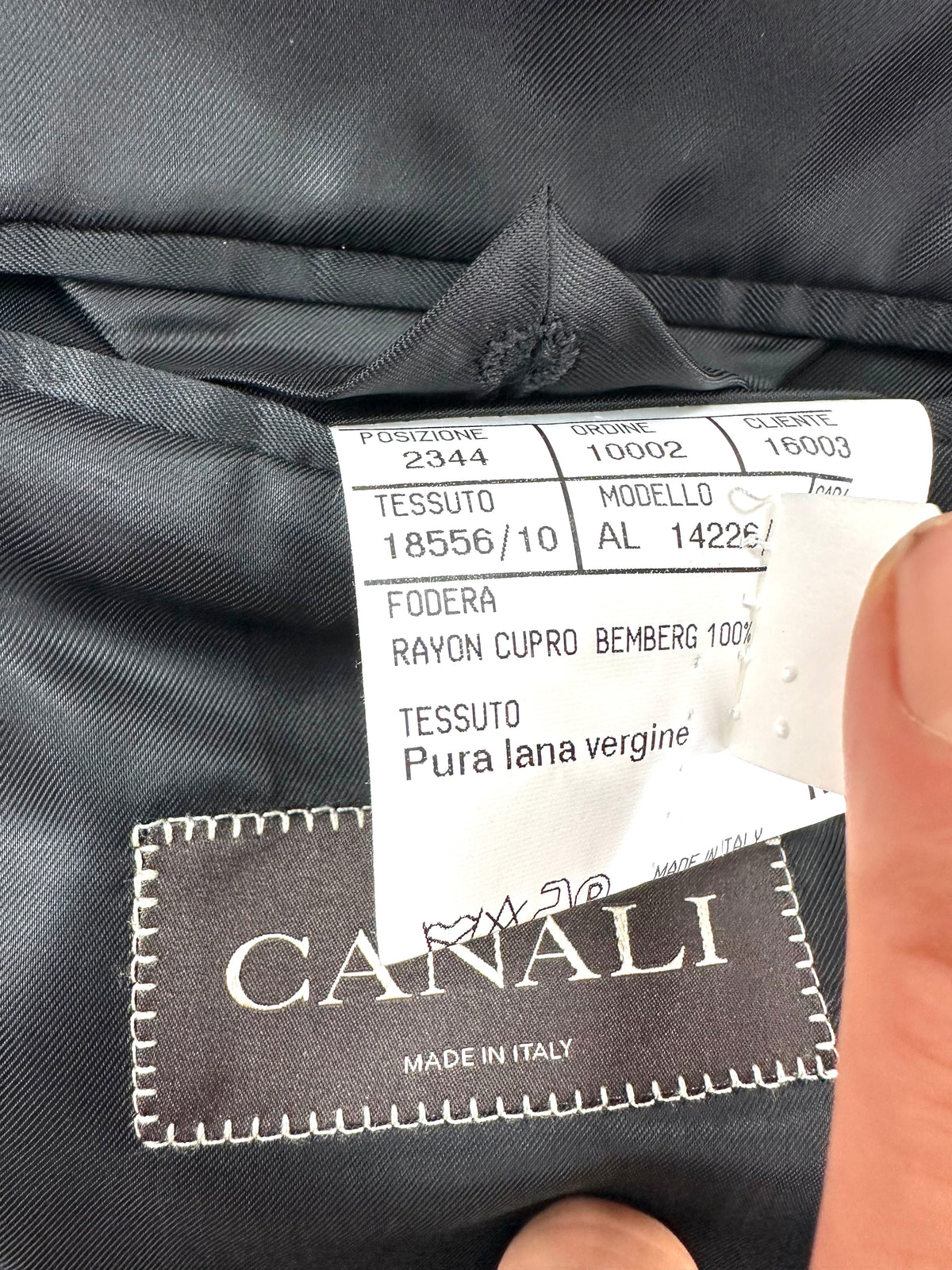 Etichetta di composizione della giacca: tessuto pura lana vergine, fodera rayon cupro