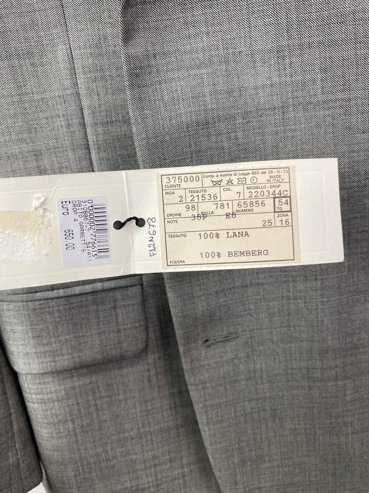 Cartellino originale Garrett's con sigillo di garanzia, 100% lana, listino 650 euro