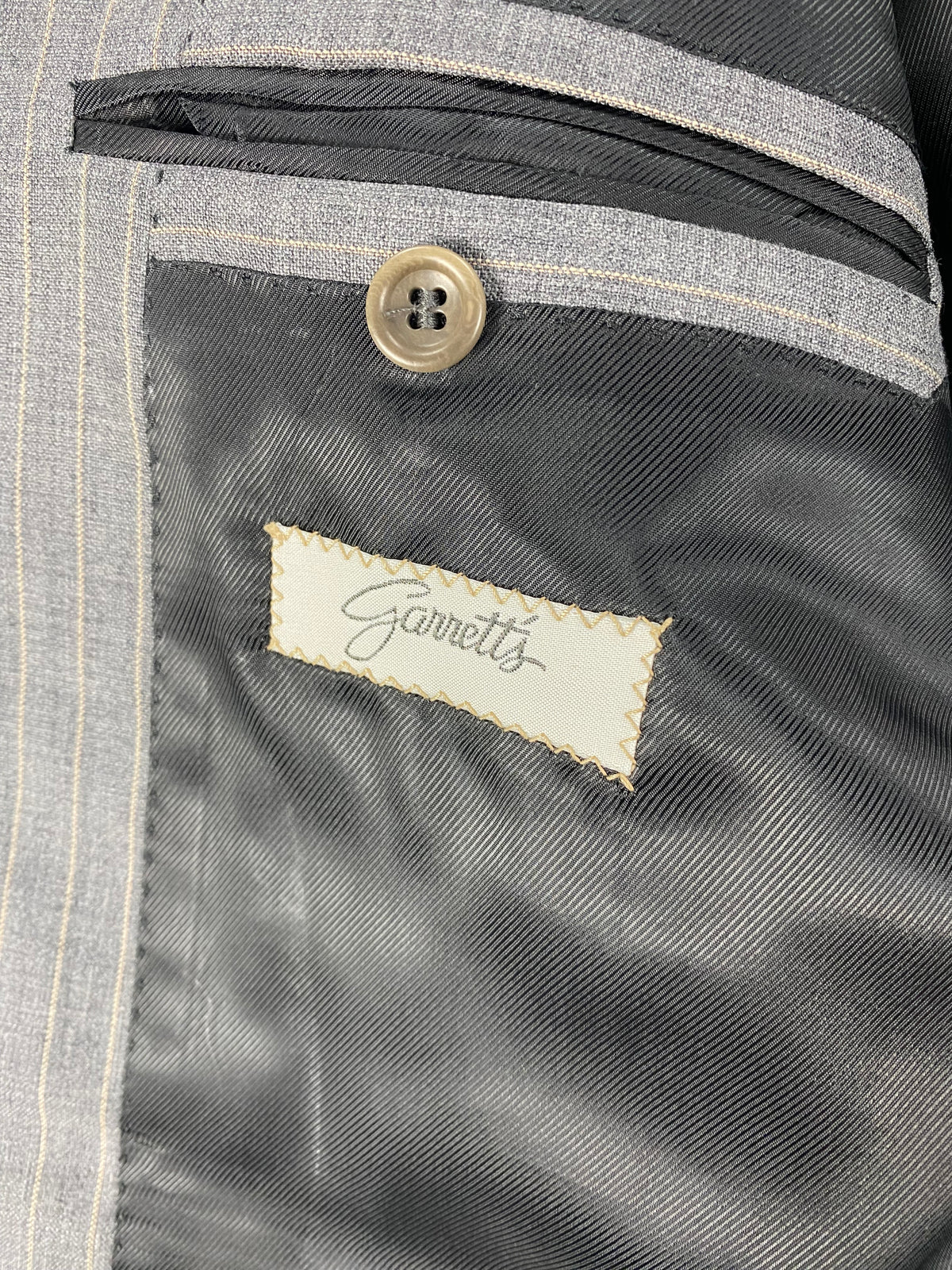 Giacca Garrett's grigia gessata vista posteriore, con spacco centrale
