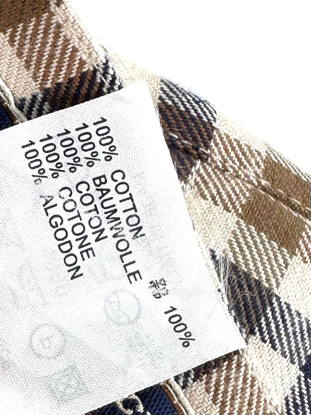 Etichetta di composizione del pantalone Aquascutum: 100% cotone, Made in Italy