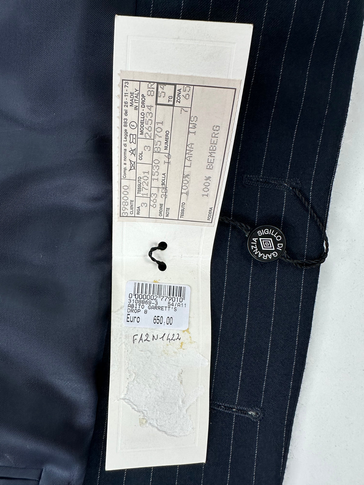 Cartellino originale Garrett's con sigillo di garanzia, listino 650 euro