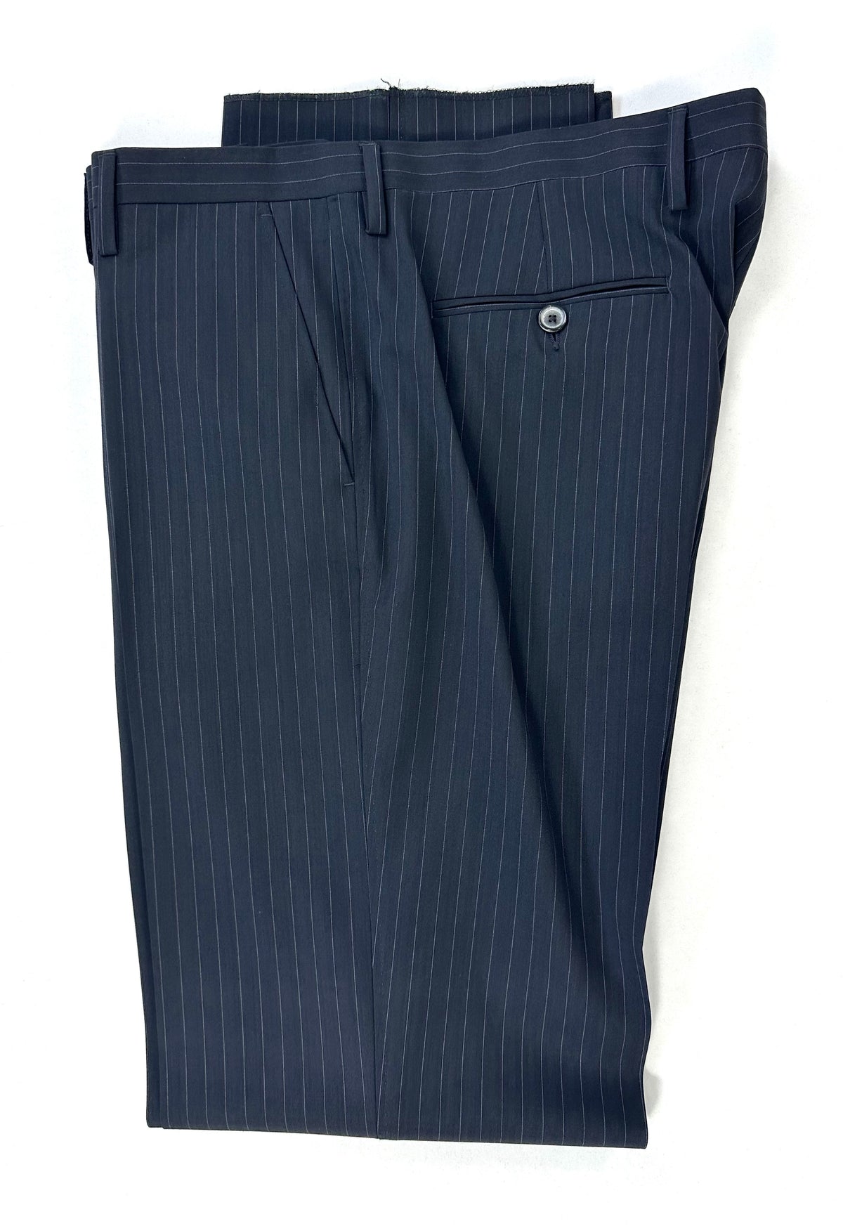 Parte alta del pantalone coordinato con tasca a filetto e passanti in vita