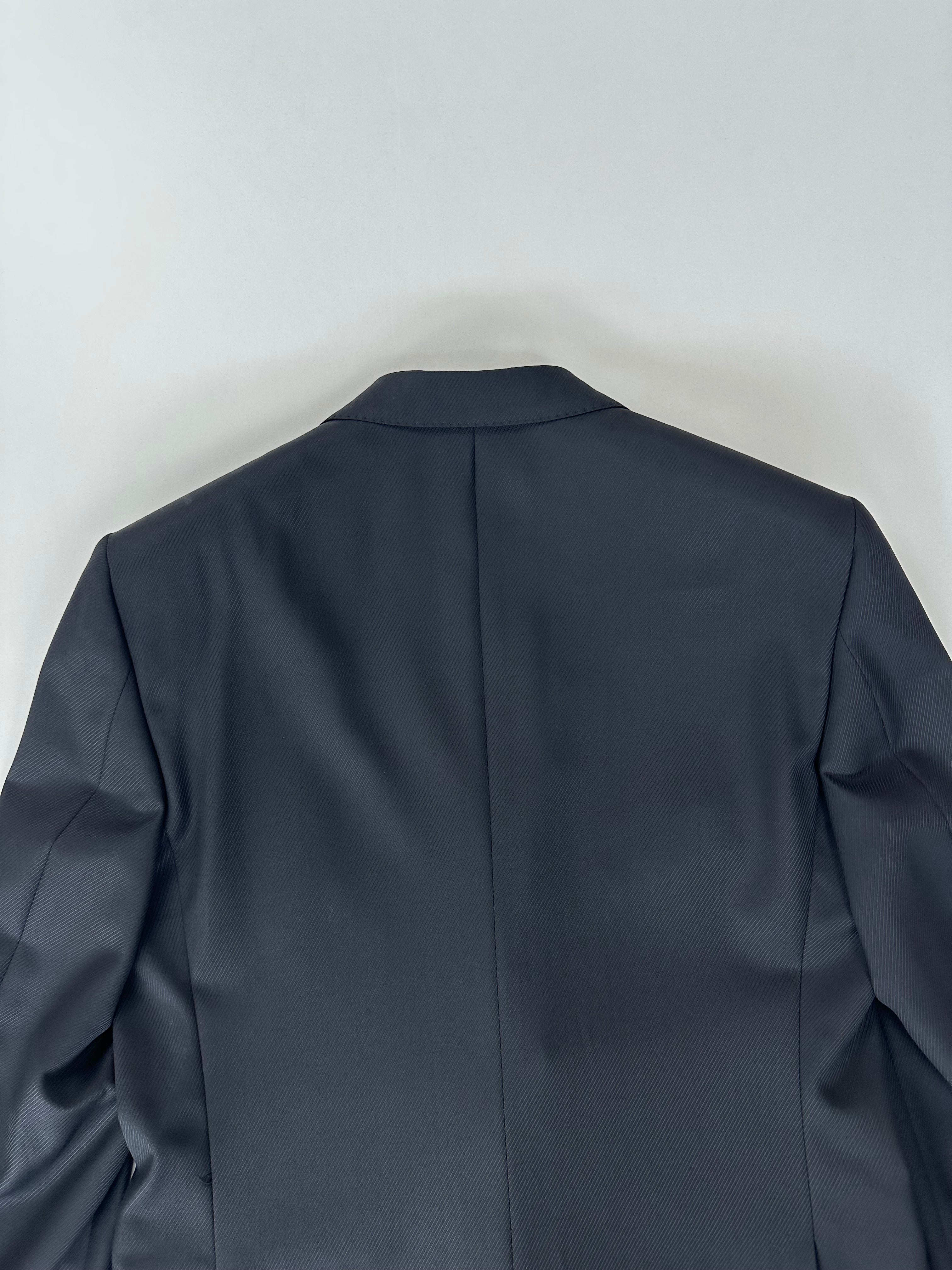 Giacca Versace Collection nera gessata obliqua, dettaglio texture gessatura obliqua