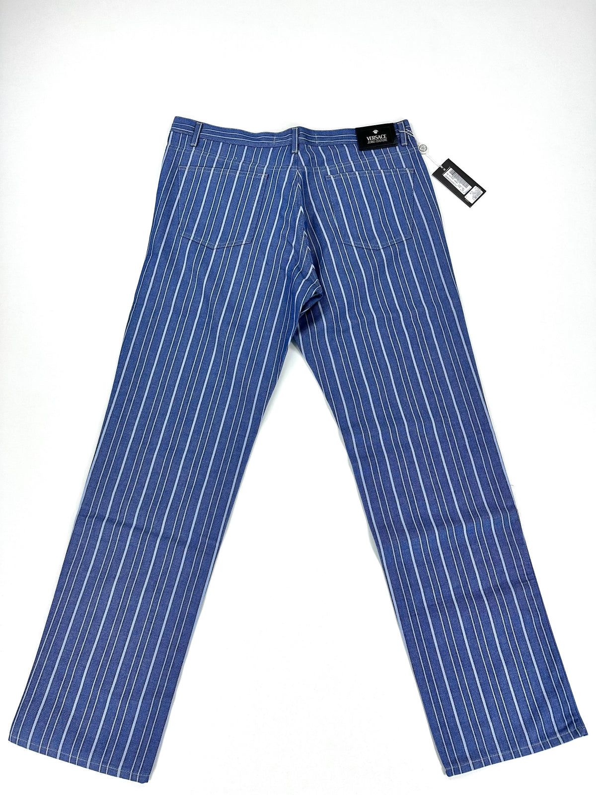 Jeans Versace Jeans Couture disteso per intero con il cartellino originale applicato in vita