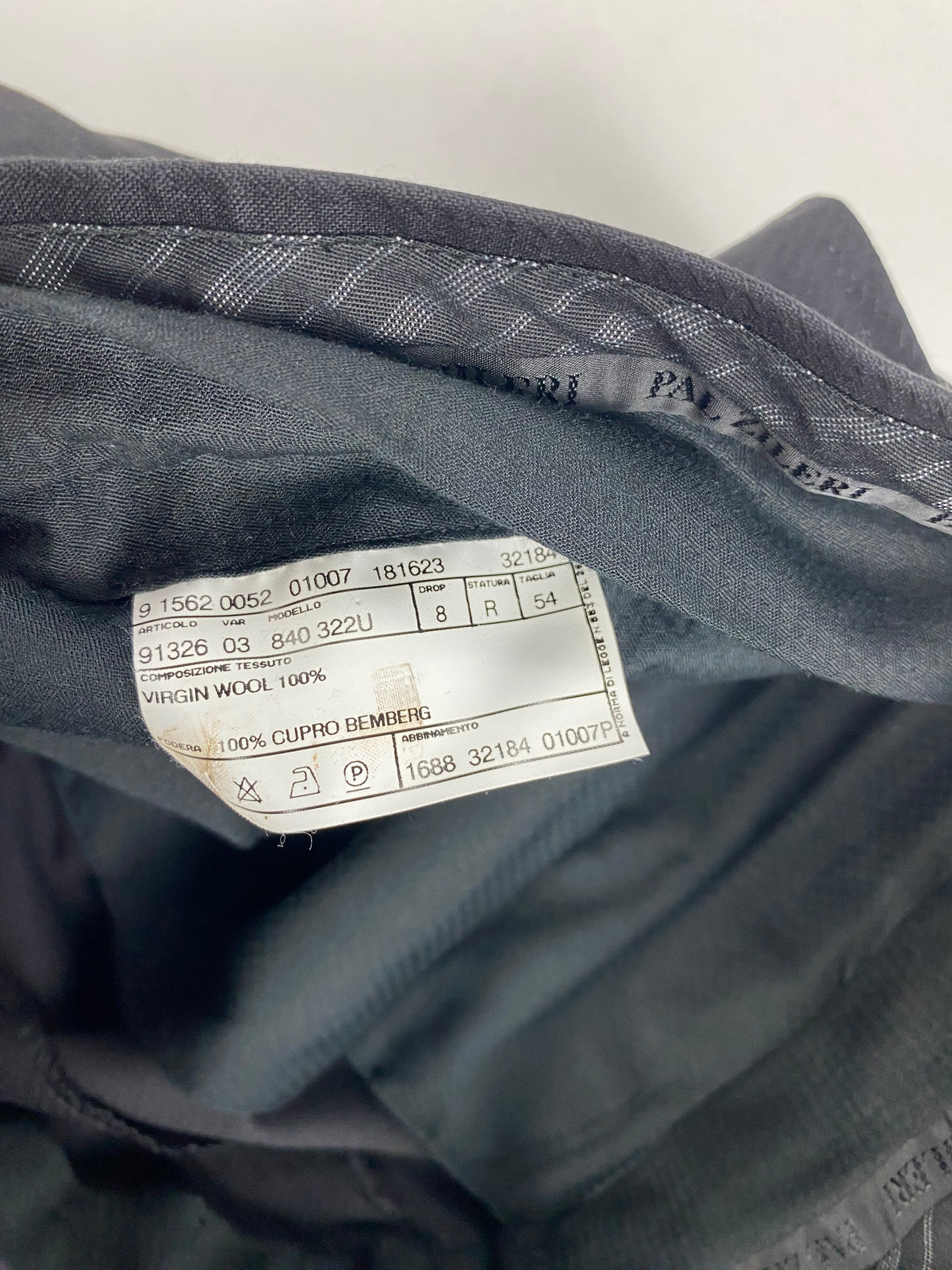 Etichetta di composizione interna del pantalone Pal Zileri, 100% lana vergine