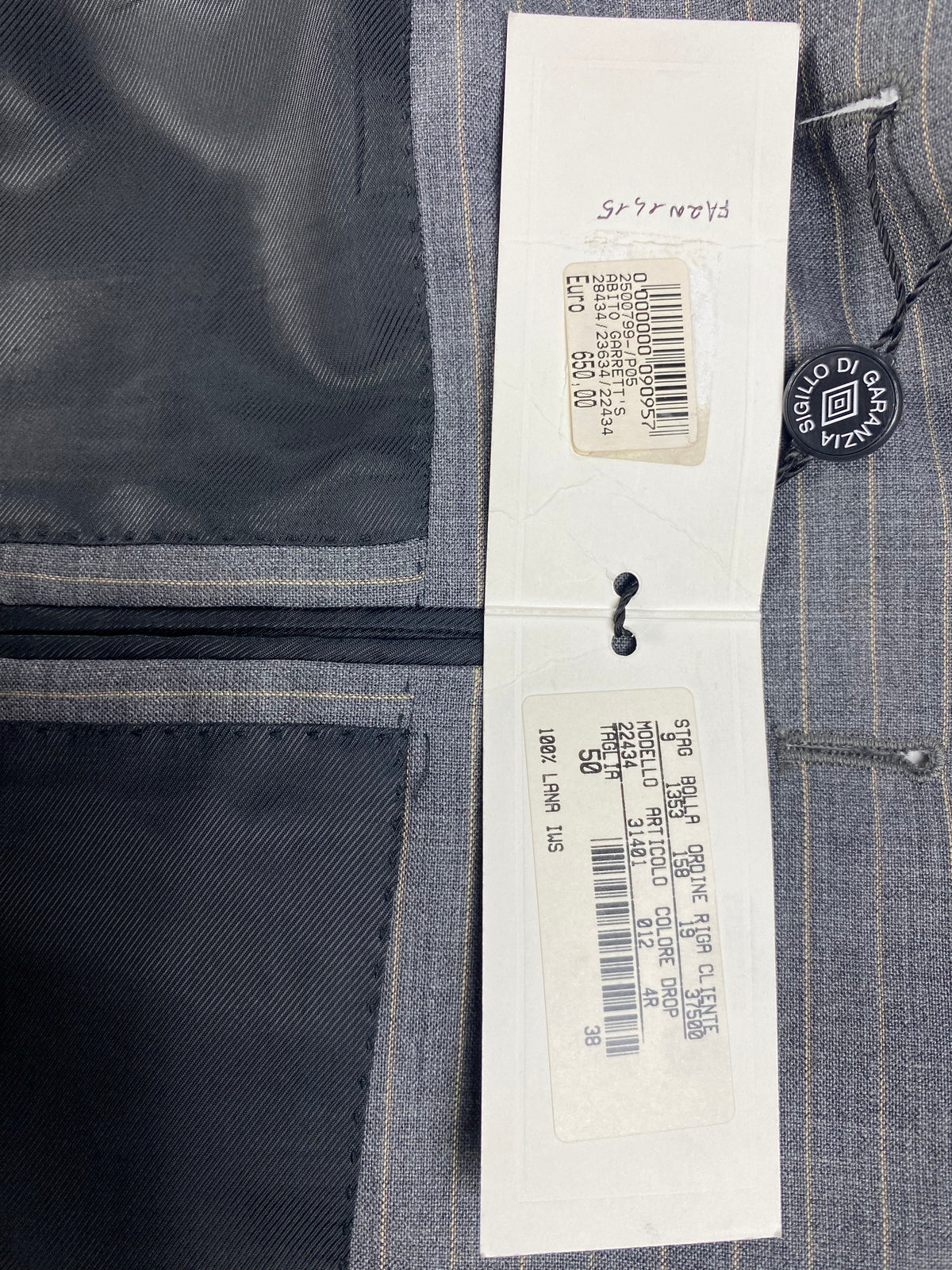 Scheda di commessa della giacca: modello 22434, tessuto 31401, colore 012, taglia 50 drop 4R, PE 2003