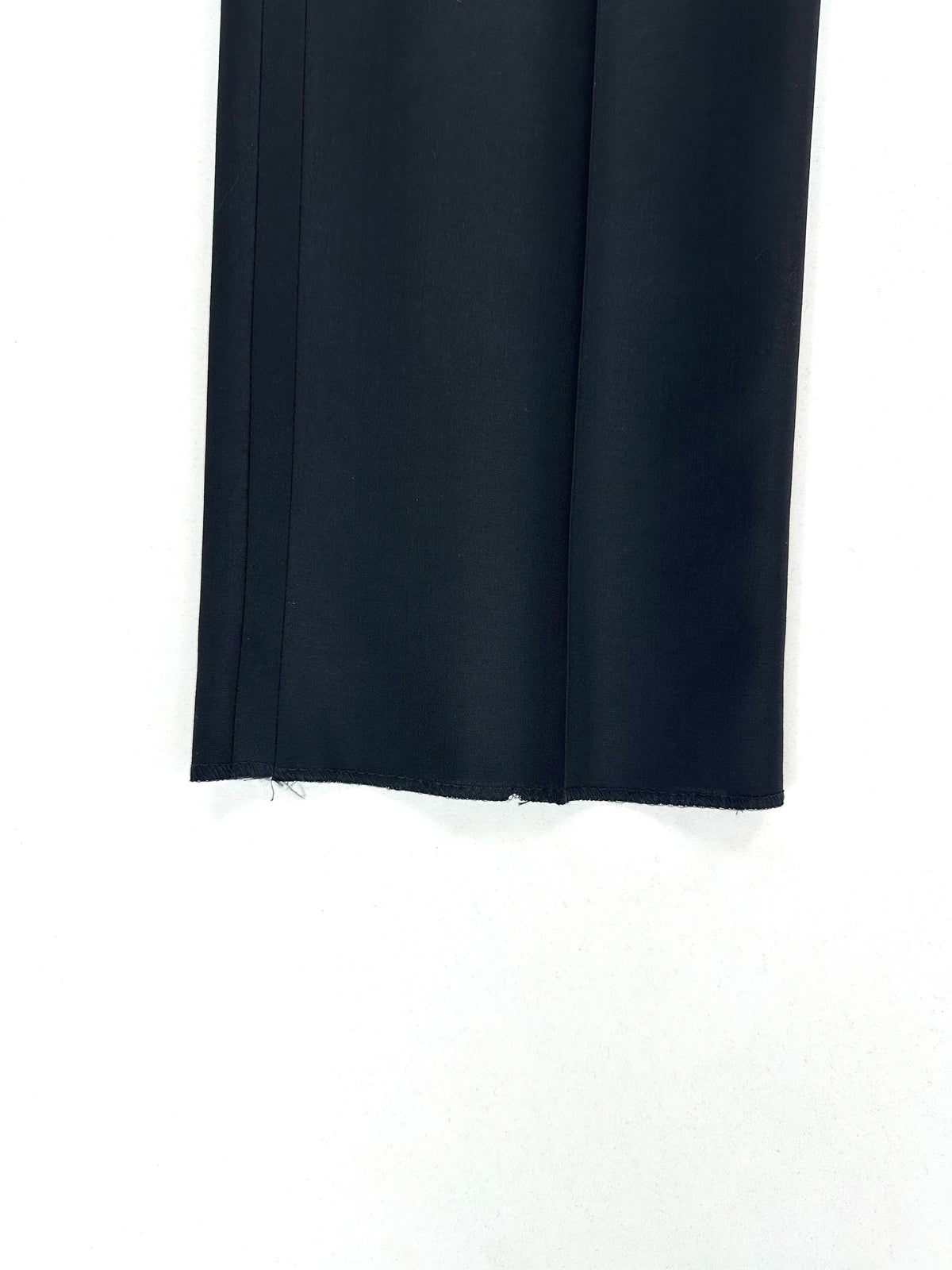 Fondo grezzo del pantalone smoking Calabró, orlo da fare