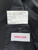 Abito Versace Classic nero coreana, dettaglio texture tessuto lana