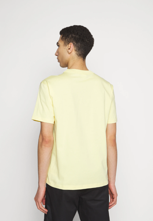 New Balance t-shirt gialla — archivio moda sportivo — IlBotteghino