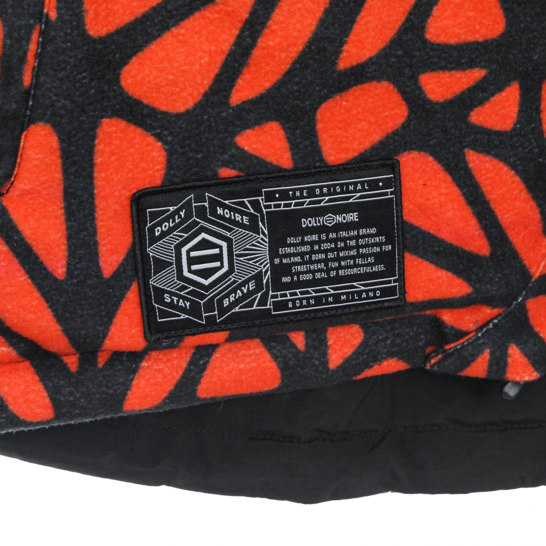 Dolly Noire giacca dubleface — dettaglio patch logo — IlBotteghino